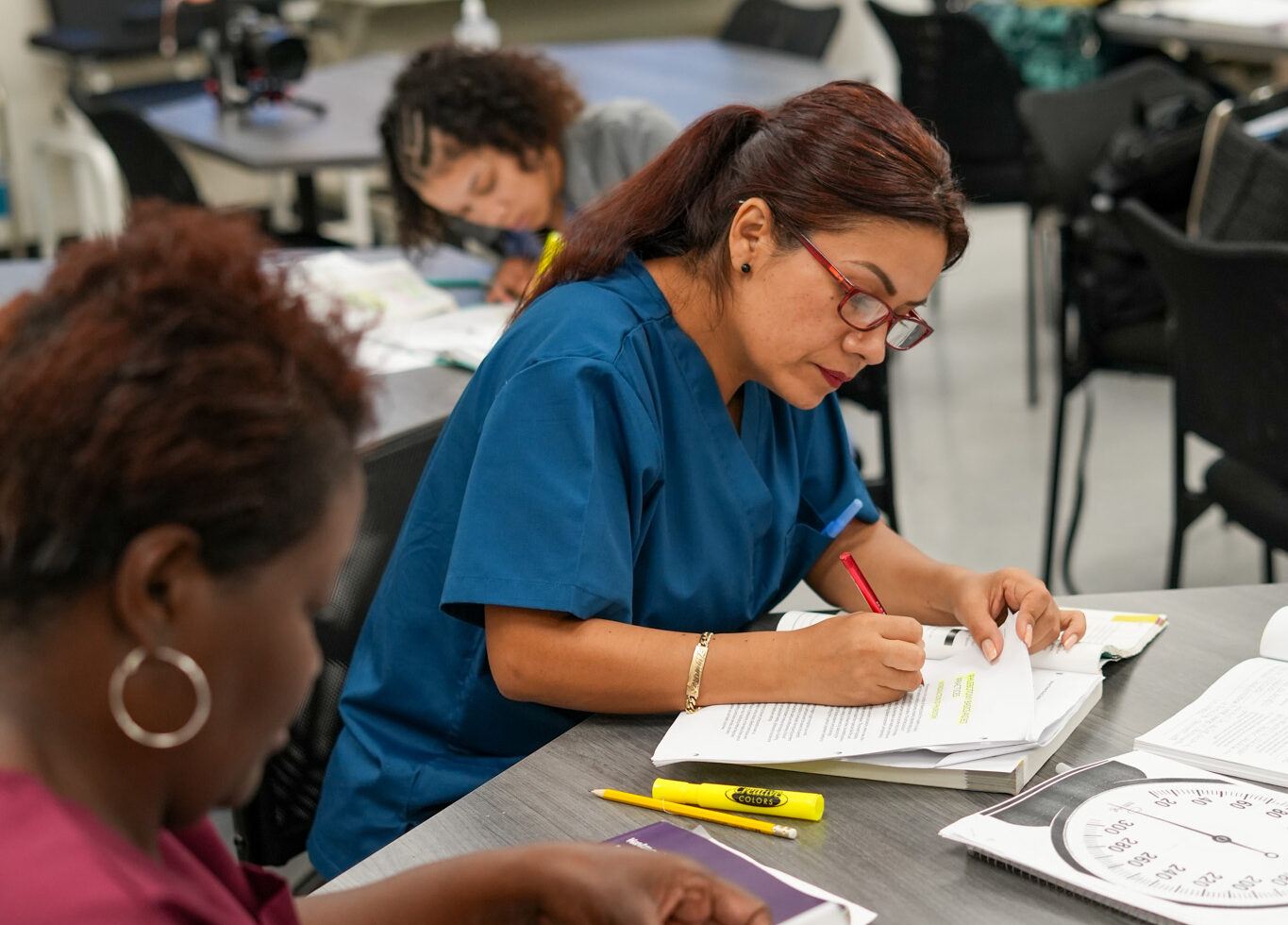 Adult education students in class at Warren Central